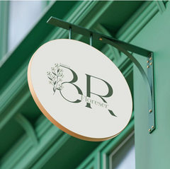 Botanical Round Name Board for Home with Green Floral Design